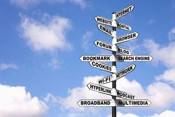 website-design-online-marketing-strategy Signpost with online marketing terminology