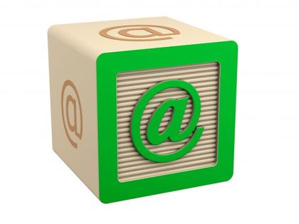 Wooden block with email @ sign