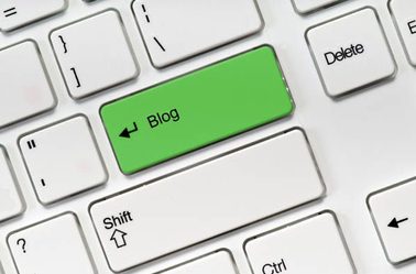 White keyboard buttons and green key blog