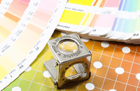 Pantone charts with magnifying glass