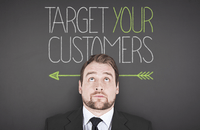 Image of businessman with arrow