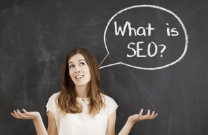 Image of girl with chalk speech bubble saying What is SEO?