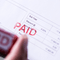 Image of 'Paid' rubber stamp on invoice