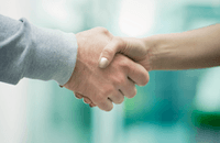 Image of business people handshaking