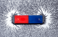 Image of magnet and iron filings