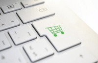 Keyboard with shopping trolley icon.