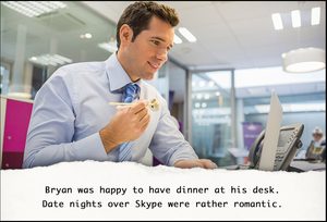 Employee eating dinner at his desk