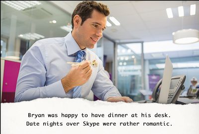 Employee eating dinner at his desk