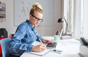 Image of woman at laptop