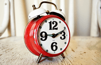 Red vintage clock with big numbers