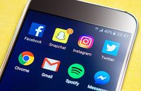Image of phone with social media apps