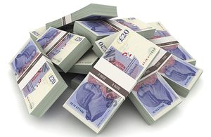 Image of bundles of £20 notes