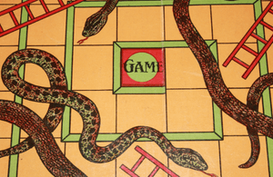 Snakes and ladders board game