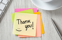 Image of a post-it note with Thank You written on it