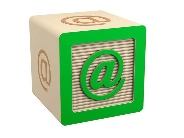 toy wooden block email at symbol sign Toy wooden block with @ symbols